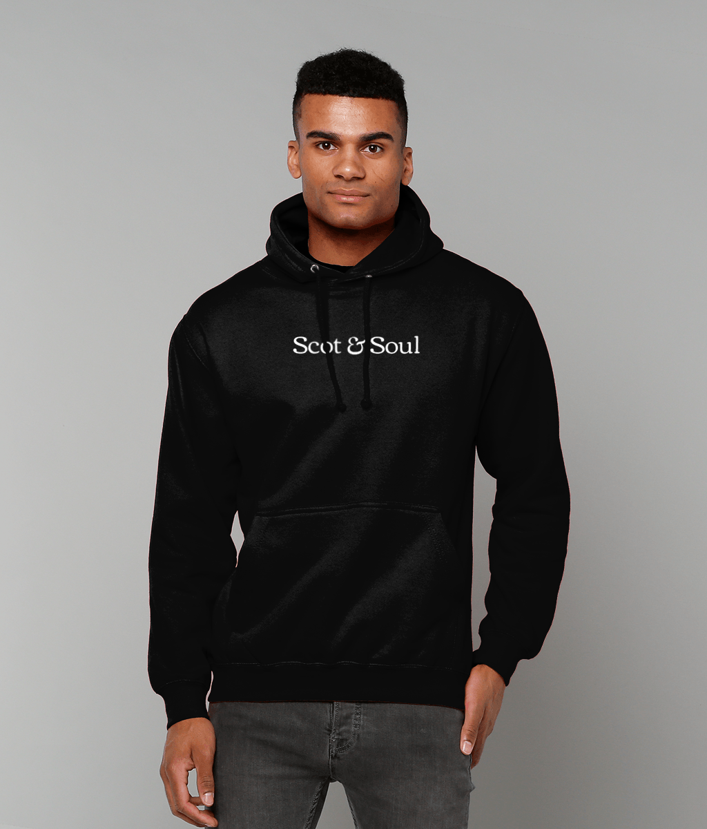 Man wearing a deep black hoodie with 'Soul & Soul' text on a grey background
